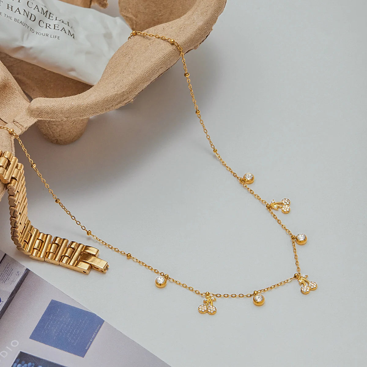 Golden cherry drop necklace